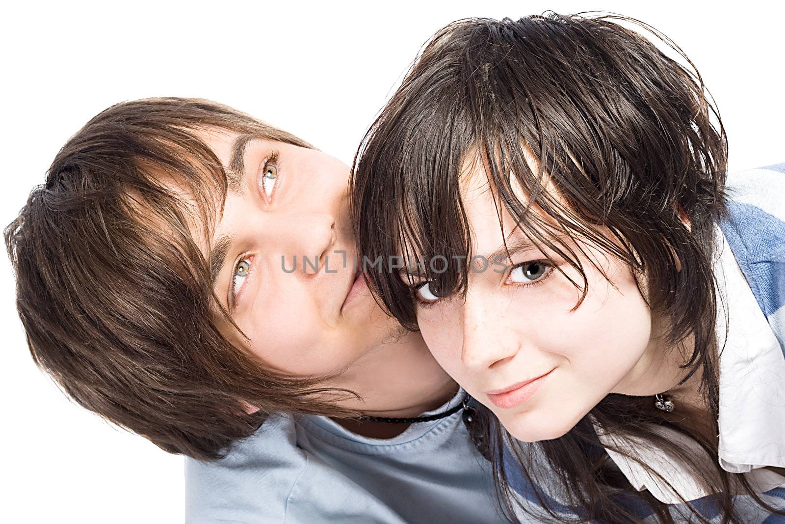 Portrait of the young couple. Isolated on white background