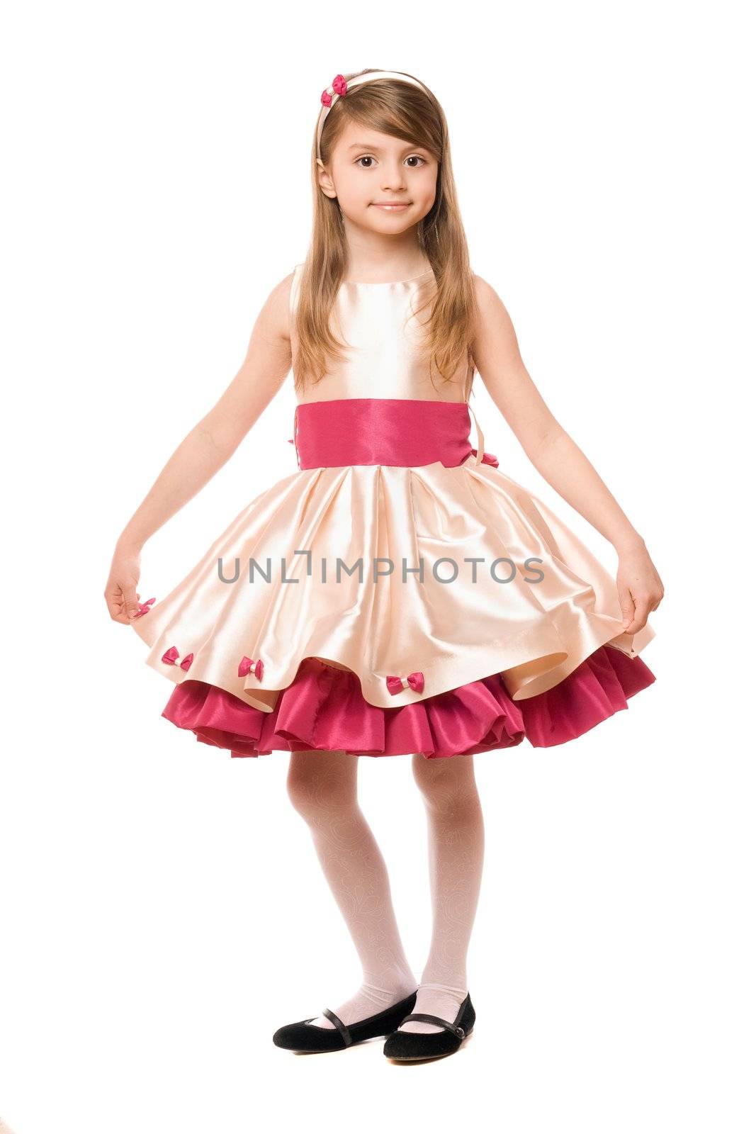 Attractive little lady in a dress. Isolated