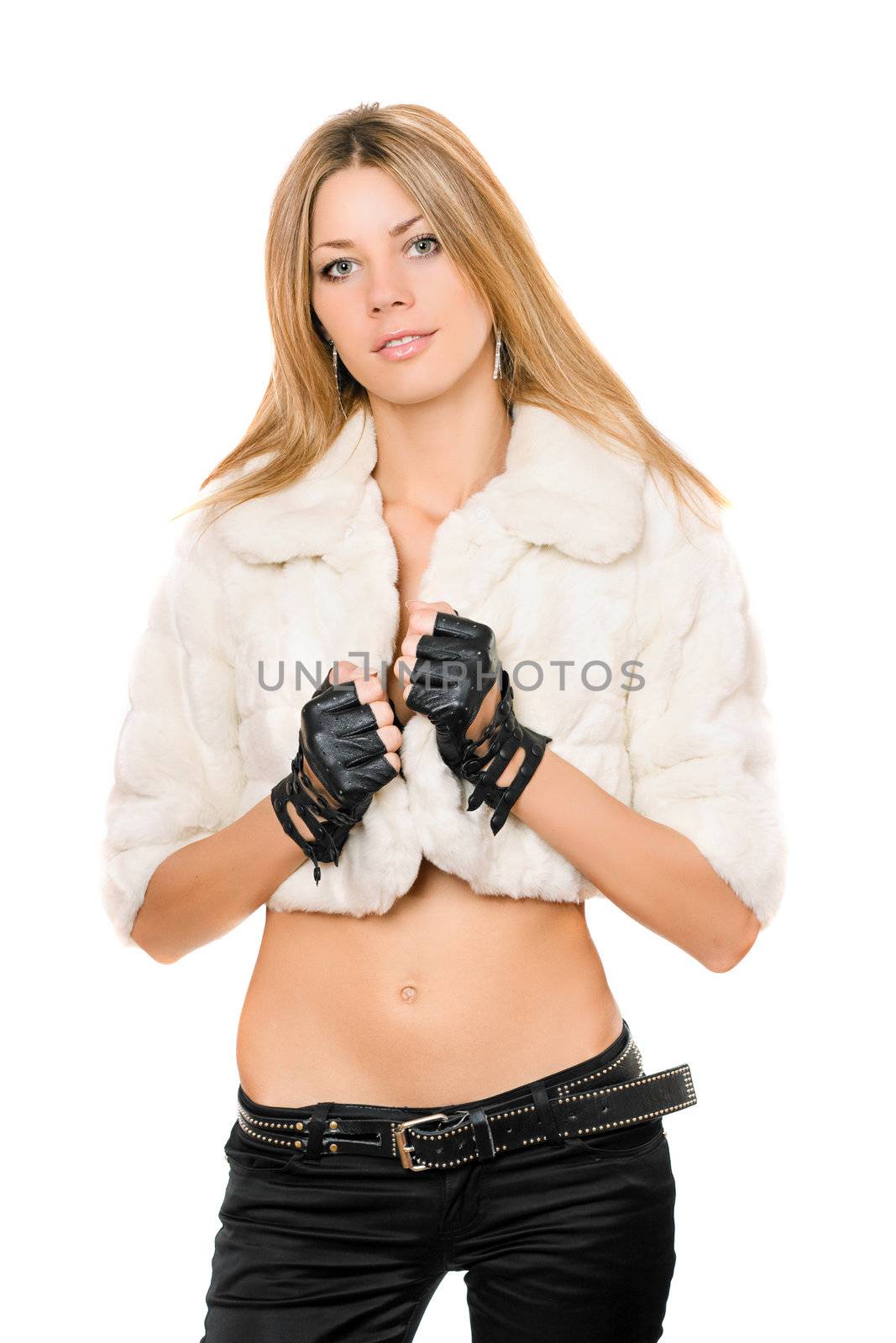 Portrait of nice young blonde in a white fur coat