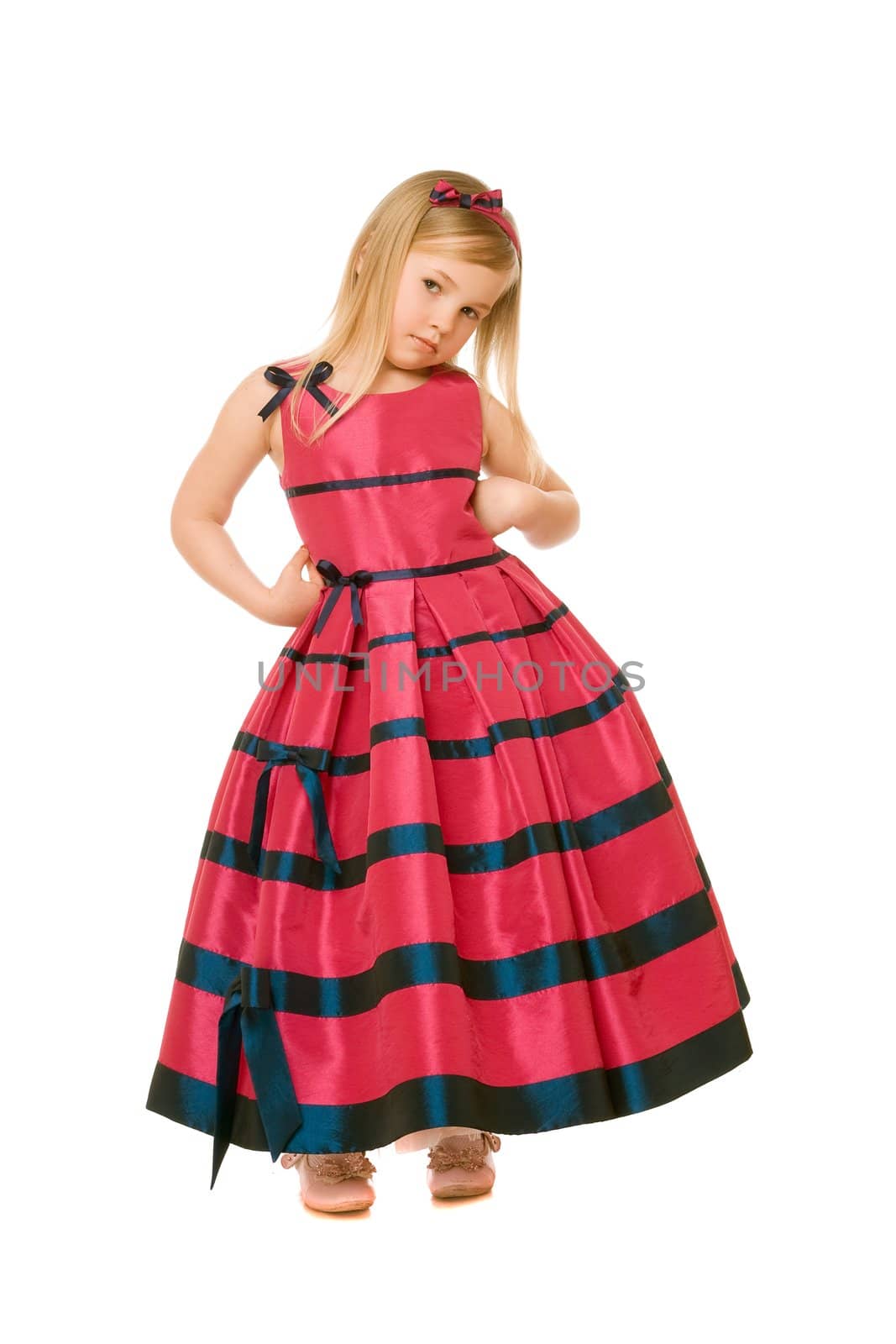 Attractive little blond girl in a long dress