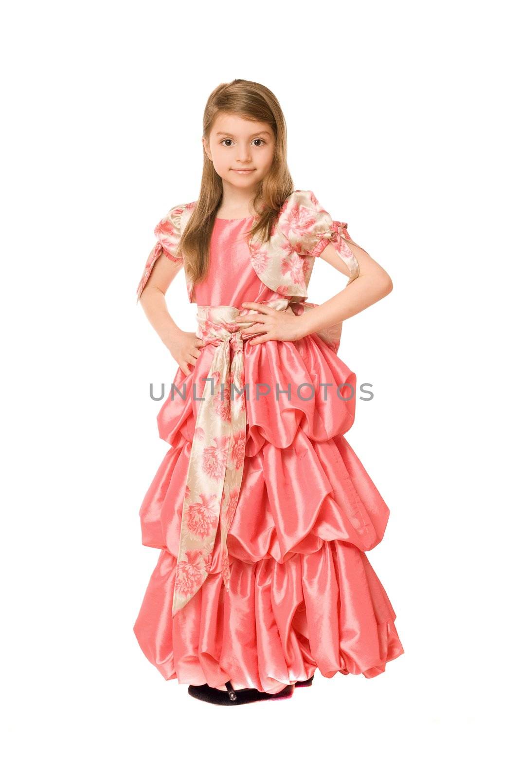 Attractive little girl in a long dress
