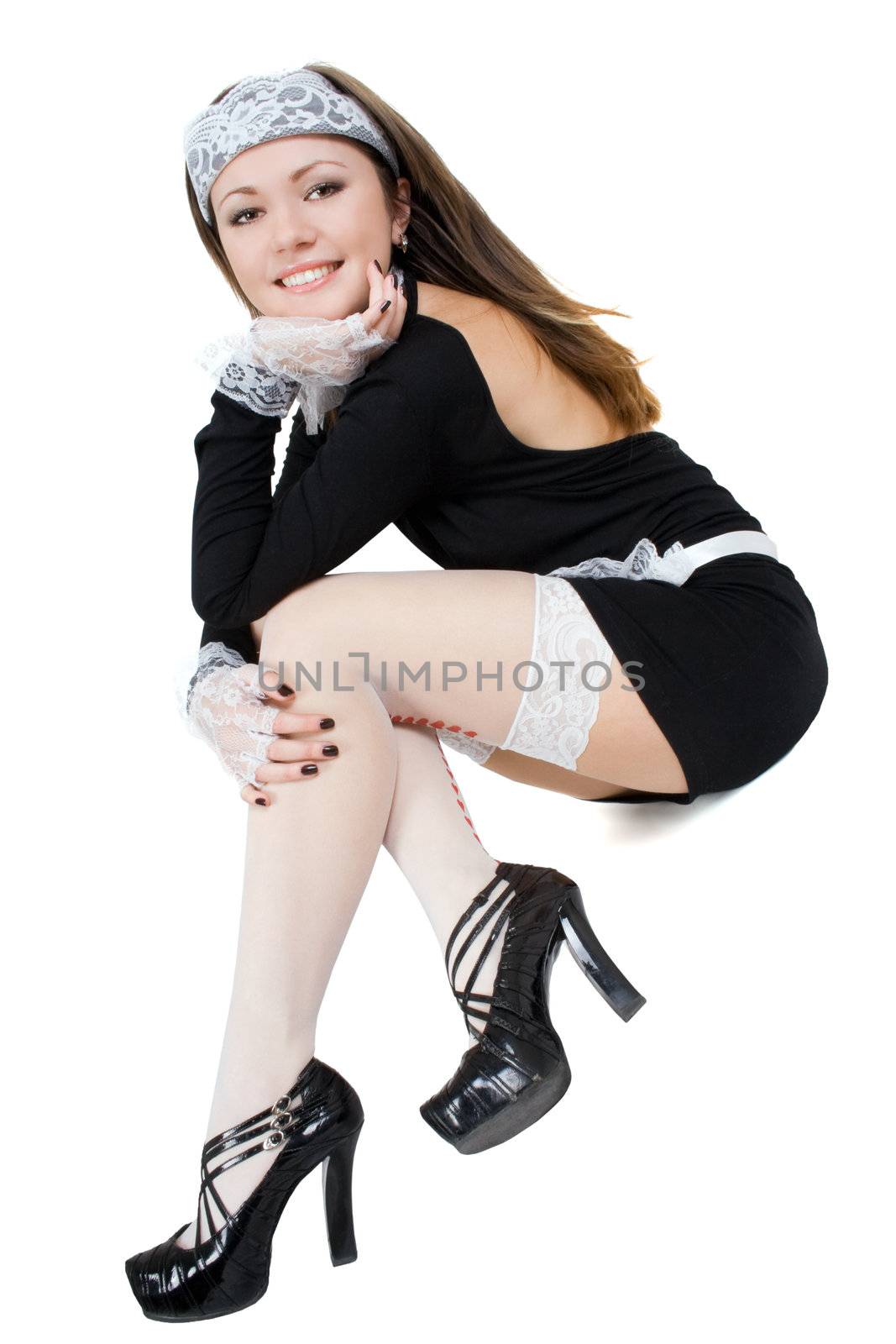 Smiling sexy young maid. Isolated on white