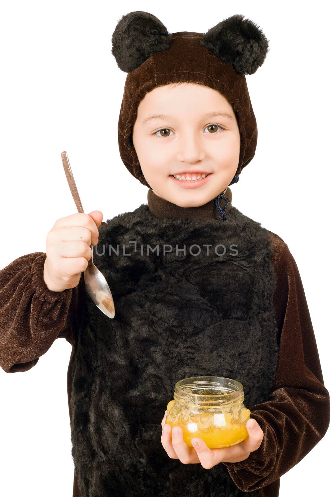 Boy dressed as bear with a jar of honey