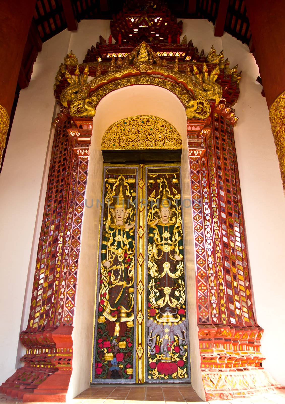 Door gate in traditional Lanna style by gjeerawut