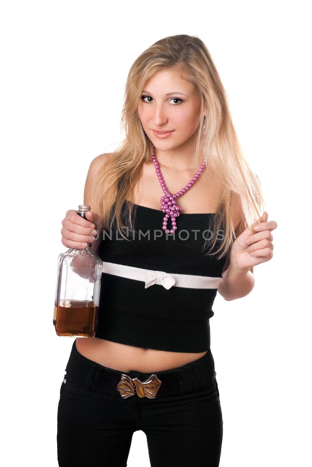 Playful young blonde holding a bottle. Isolated on white