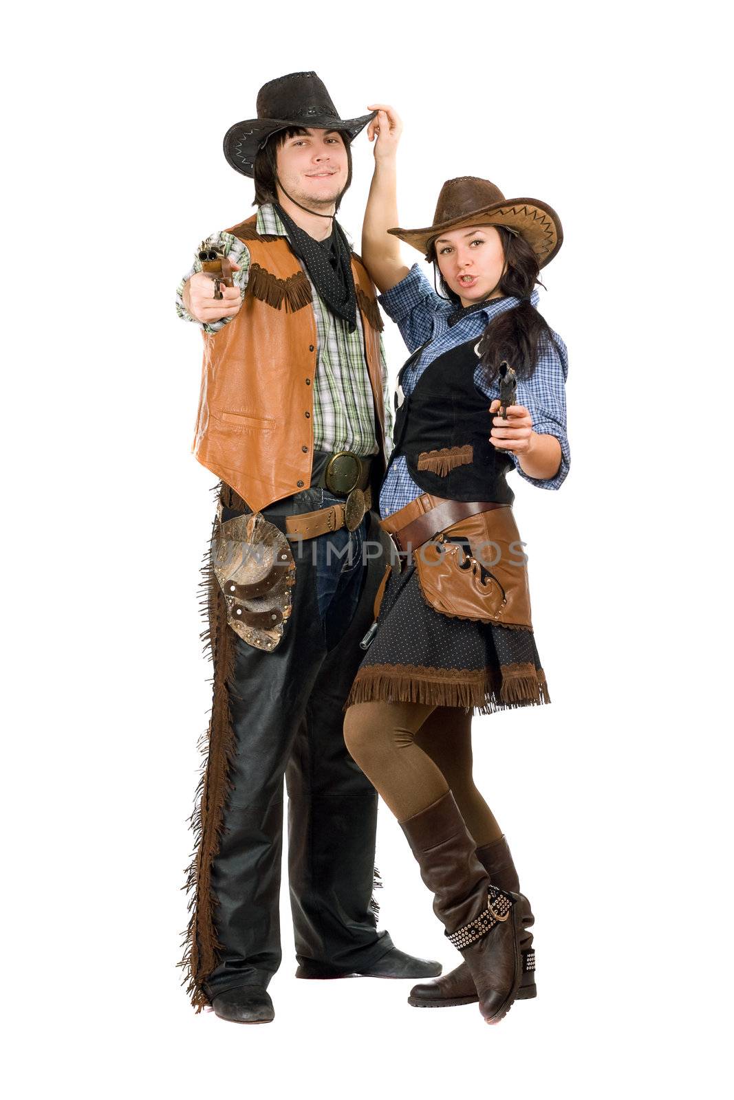 Young cowboy and cowgirl with a guns in hands