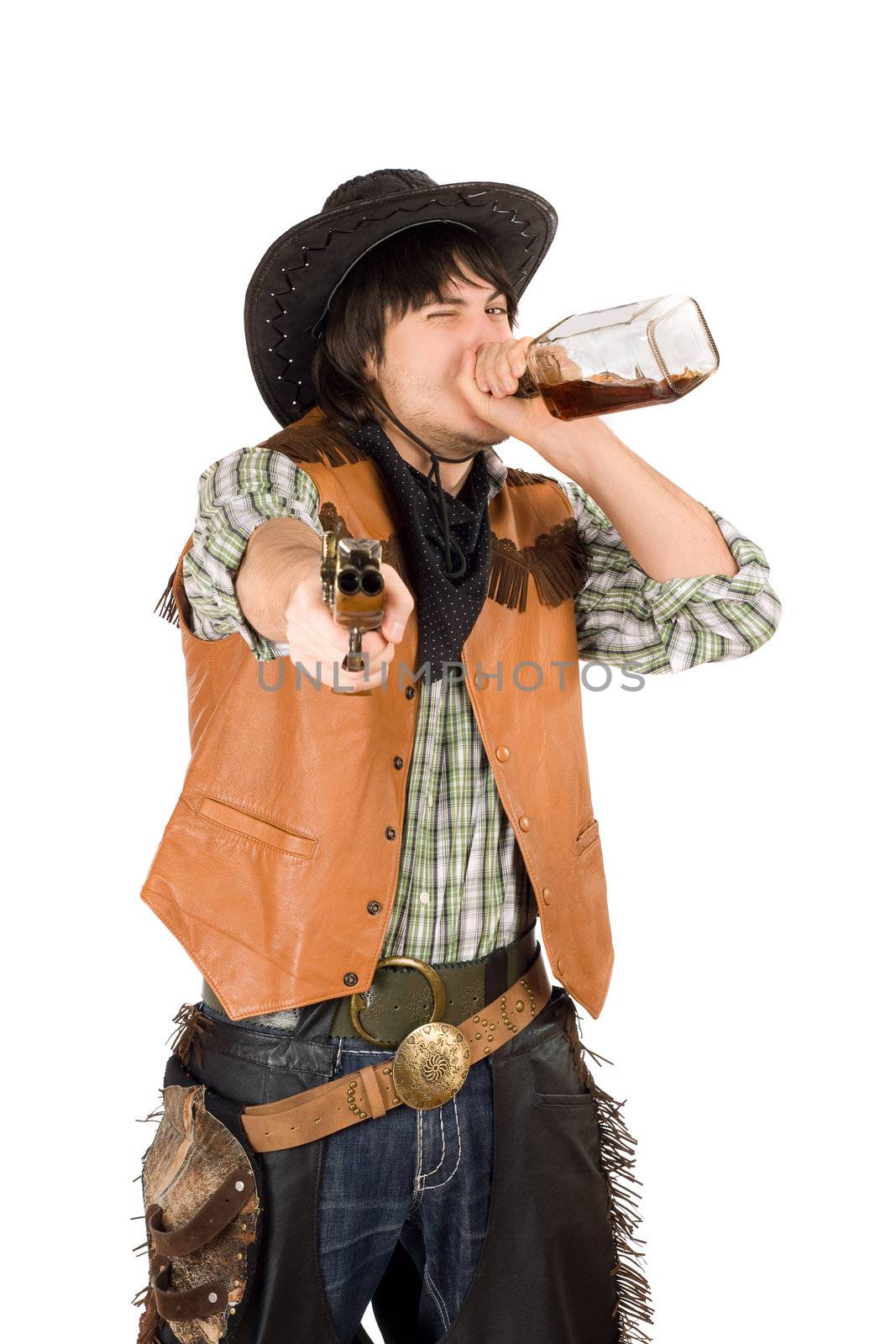 Cowboy drinking whiskey from the bottle. Isolated on white
