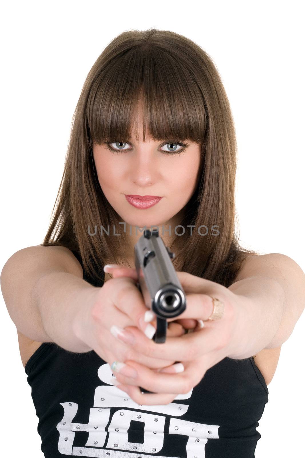 Pretty girl in a vest with pistol