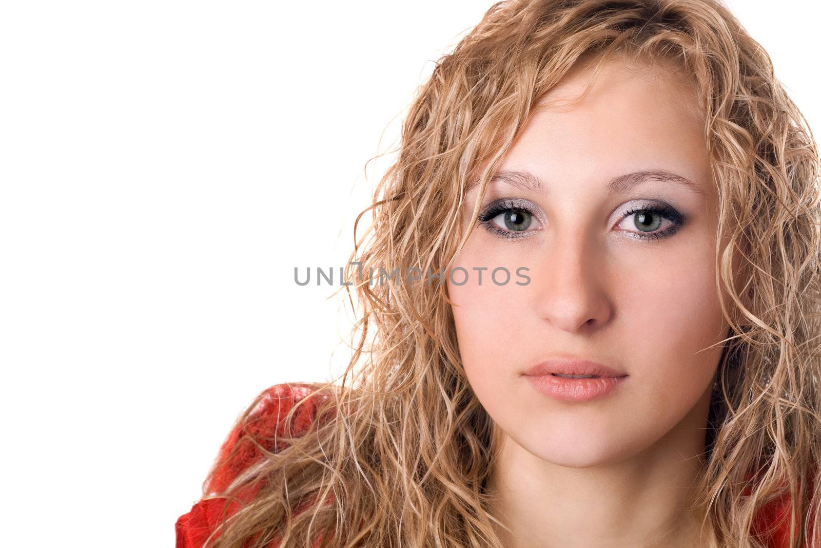 Close-up of young pretty thoughtful blonde. Isolated on white