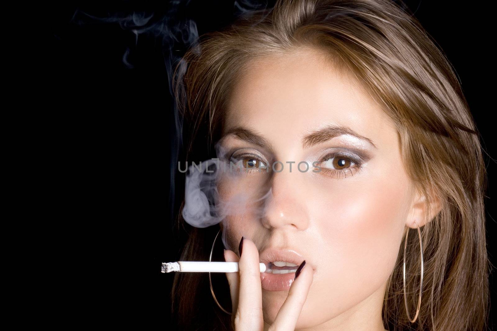 portrait of the beautiful young woman with a cigarette 2