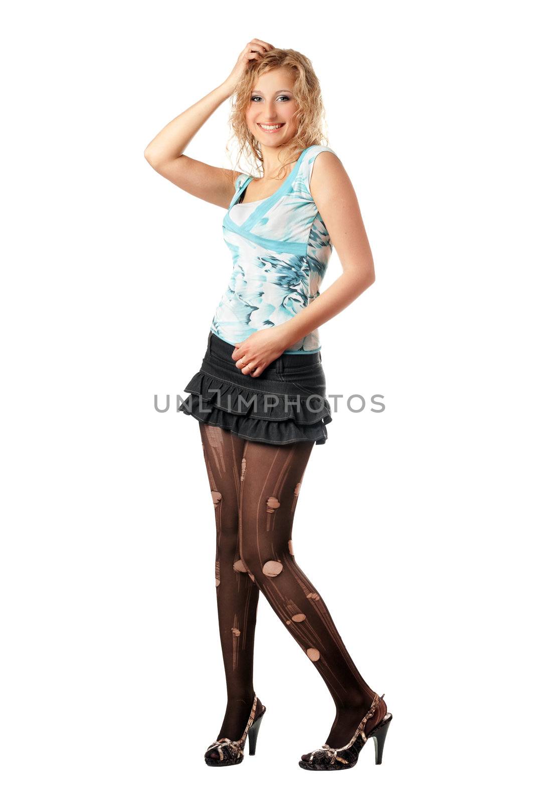Smiling pretty young blonde in torn pantyhose. Isolated