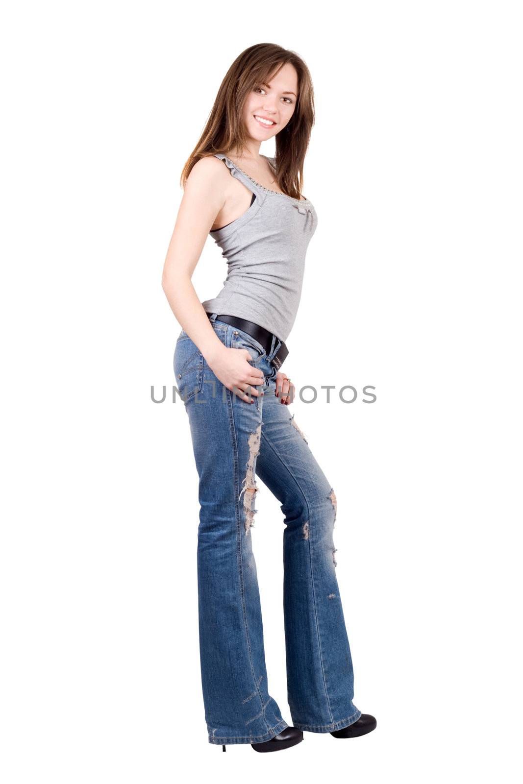 Pretty young woman in a blue jeans. Isolated