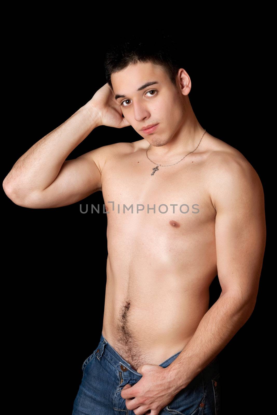 Portrait of attractive guy. Isolated on black