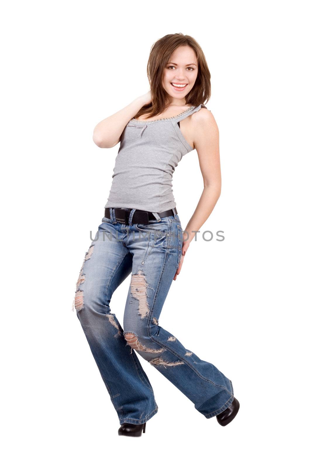 Smiling young woman in a blue jeans. Isolated