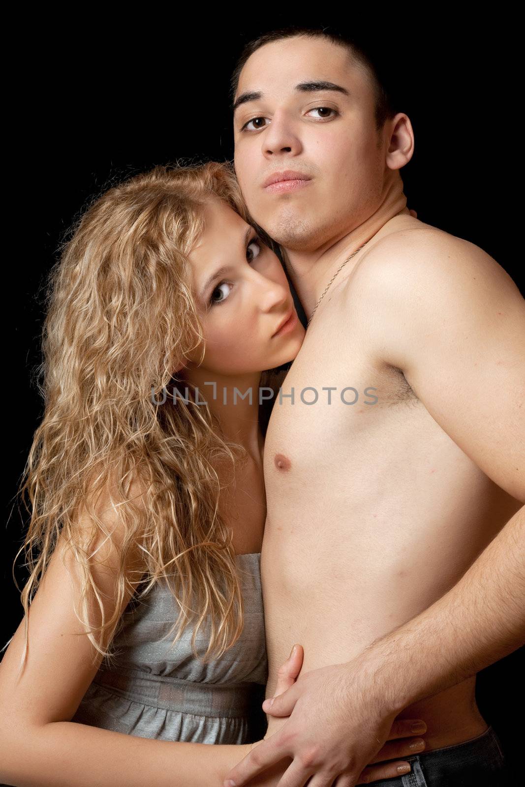 Portrait of a passionate attractive young couple. Isolated