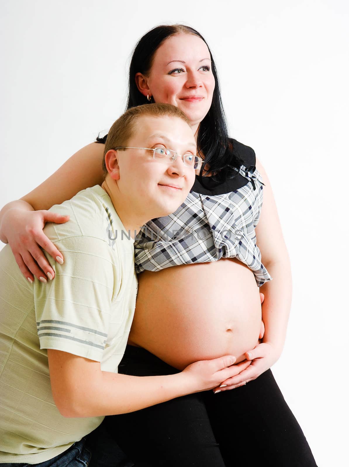 Young couple. A pregnant woman and a man