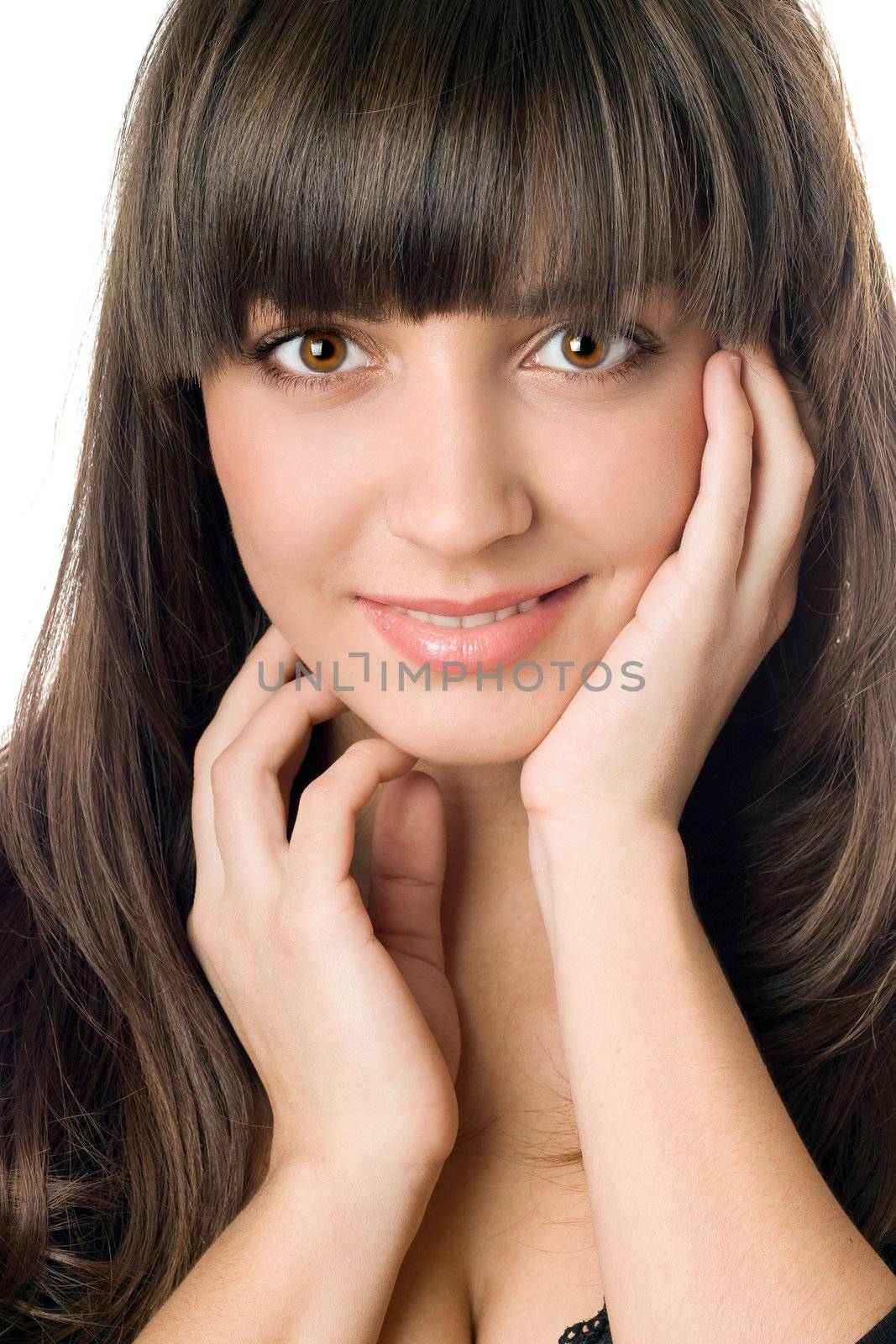 Portrait of young woman with dark hair and brown eyes. Isolated