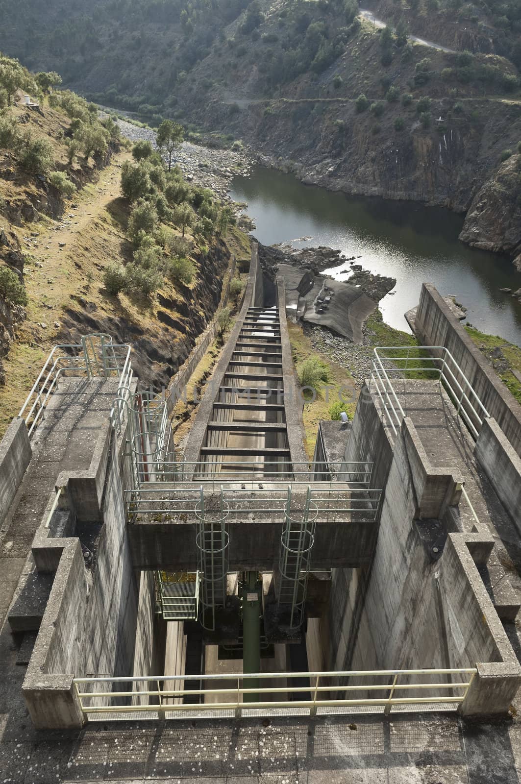 Overflow spillway in the old hydroelectric Pracana dam, Ocreza river, Santarem, Portugal