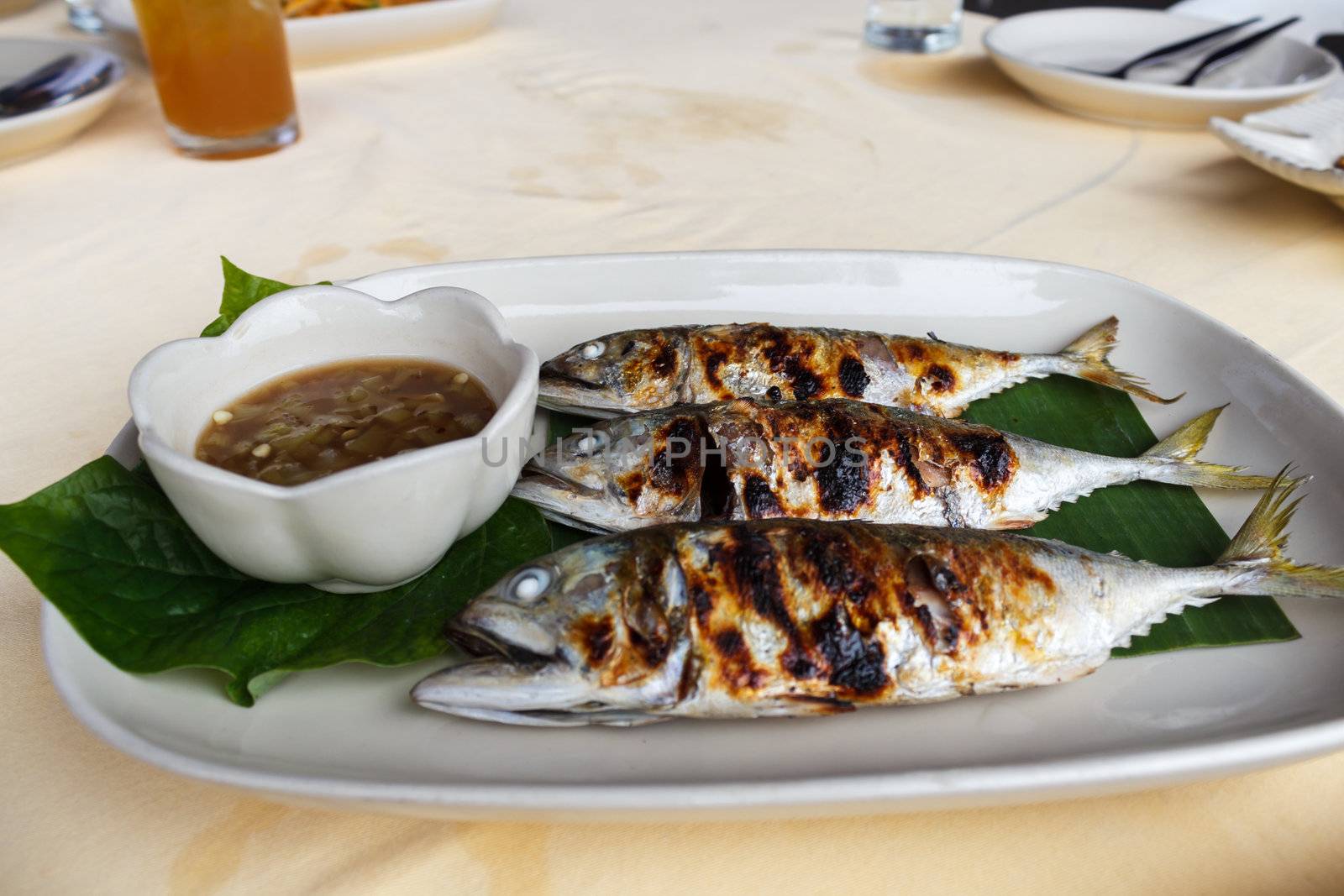 Grilled scomber fish with special fish sauce.