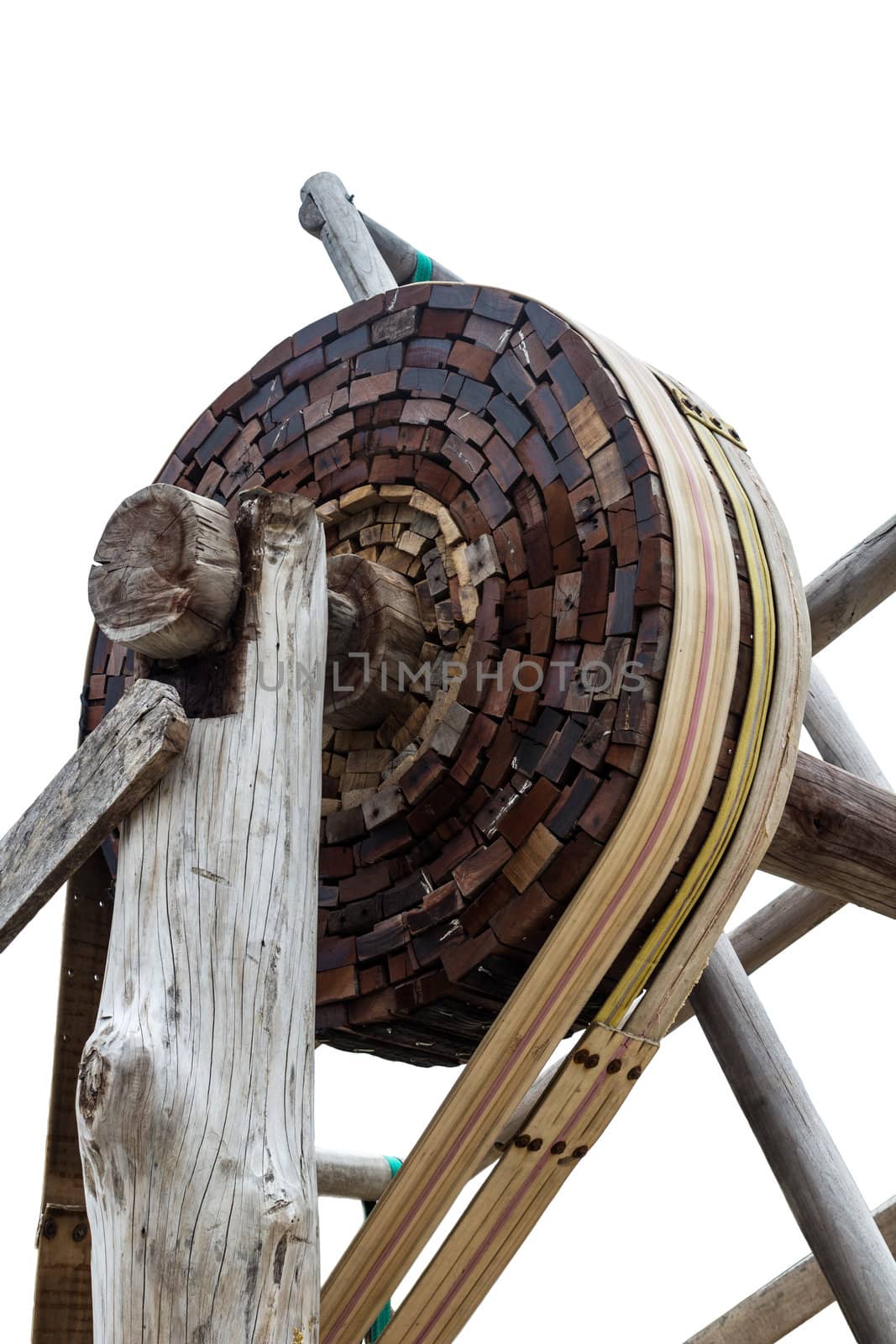 Old wooden gear isolated on white background.