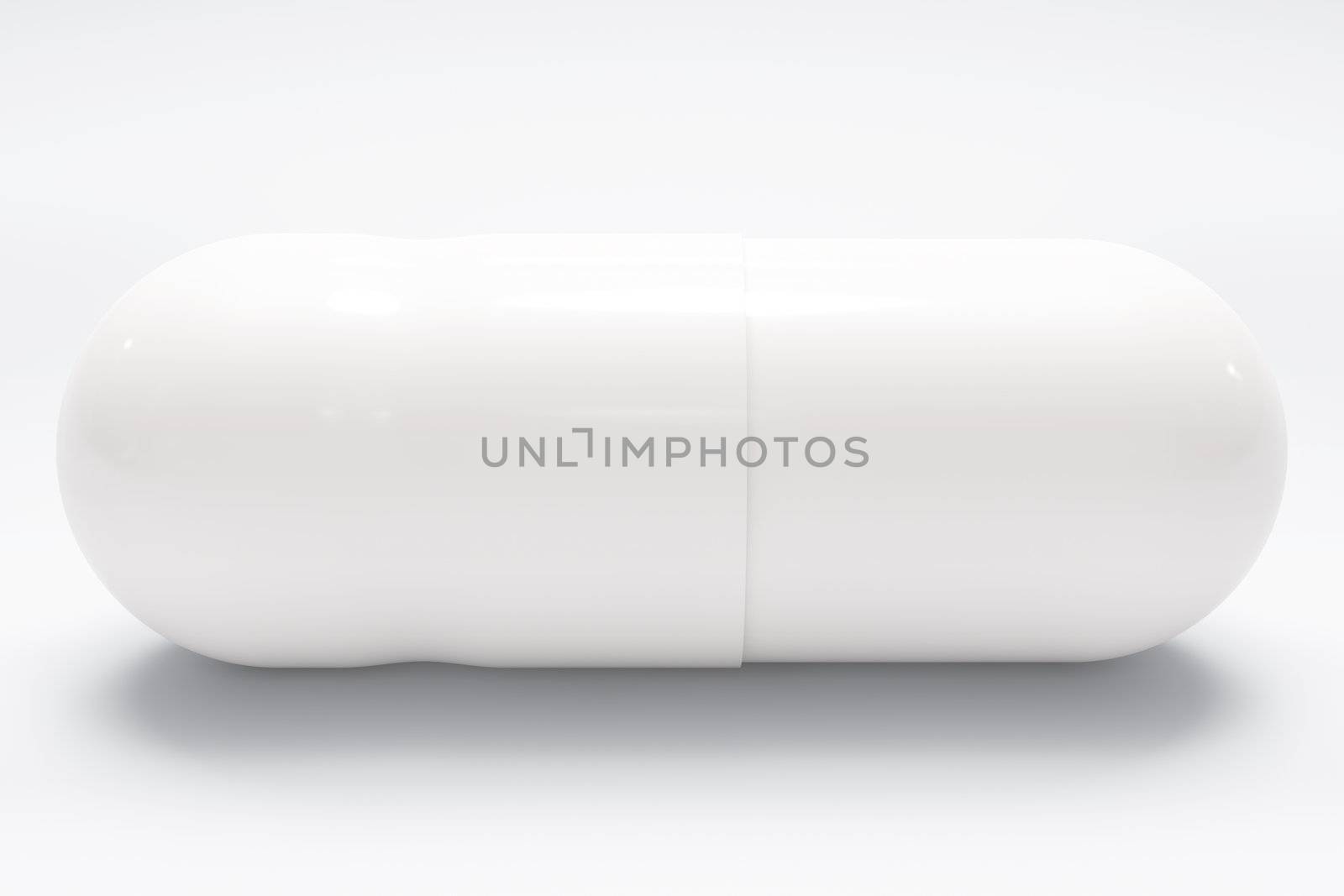 White medical pill on white background, with shadow, closeup