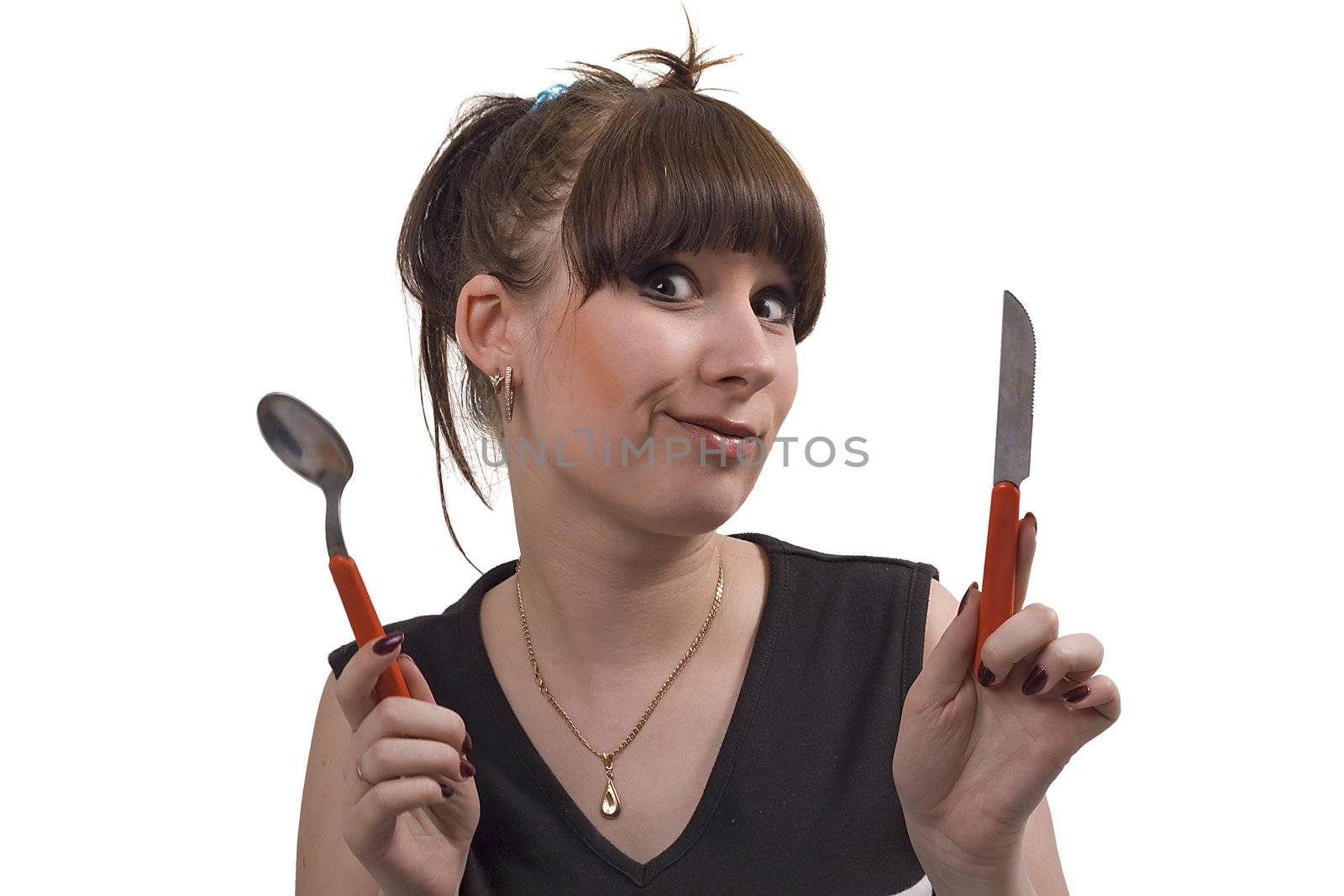 The mad housewife with knife and spoon. funny picture