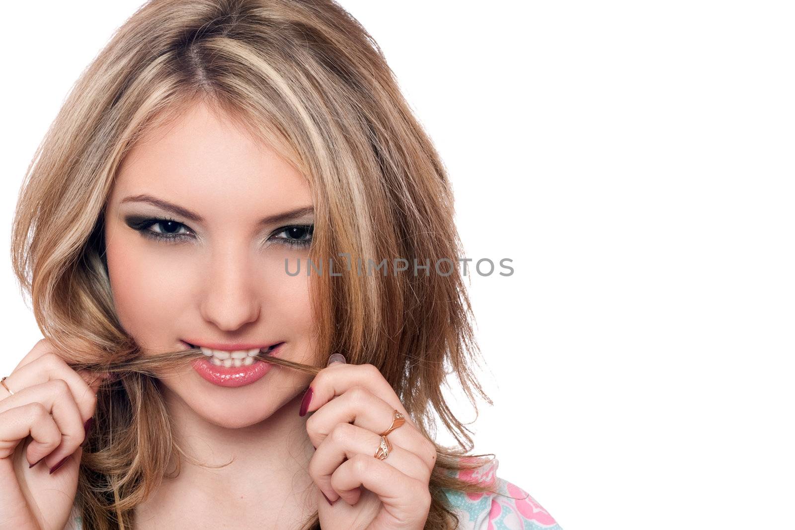 Closeup portrait of passionate young blonde. Isolated on white