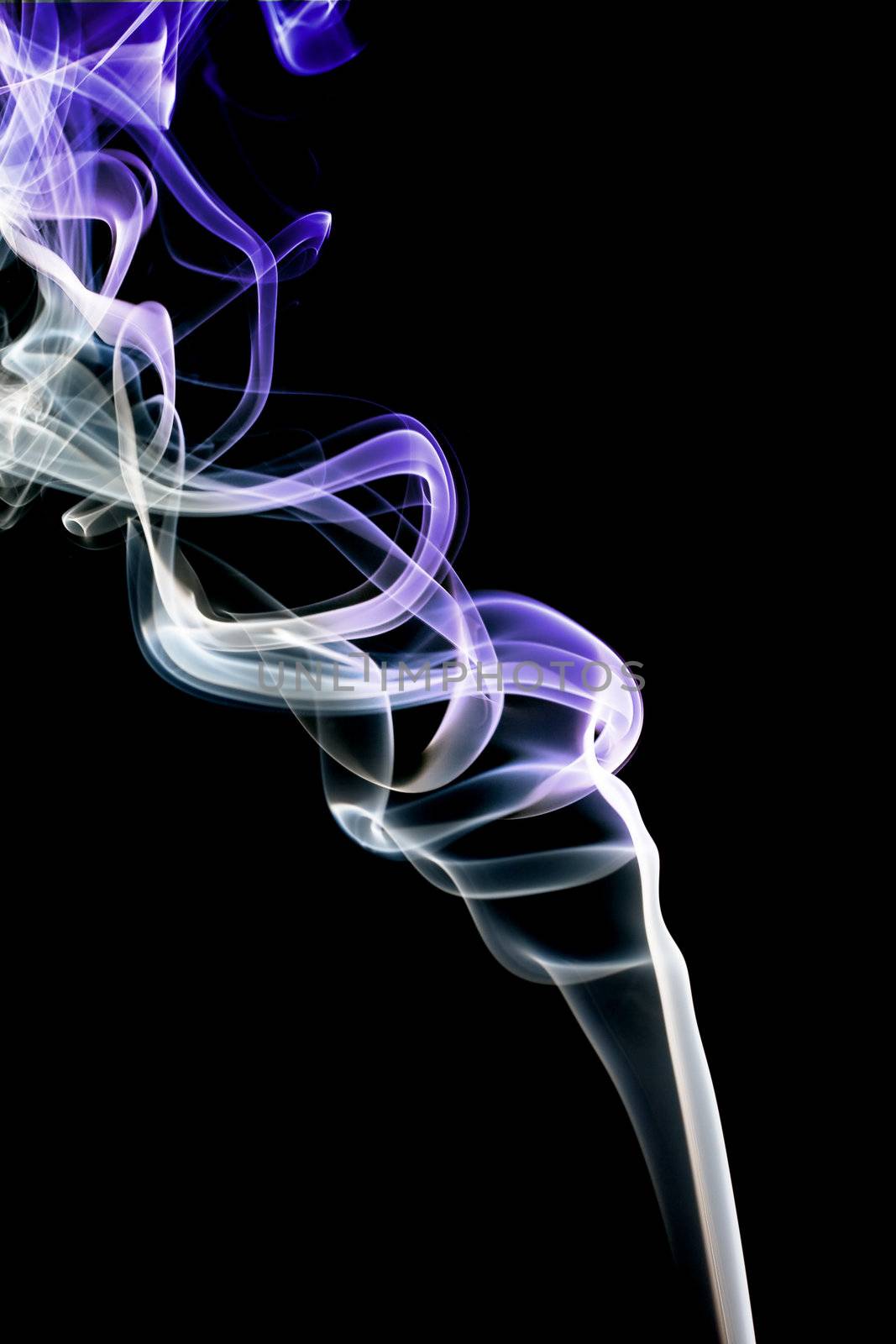 Abstract violet smoke. Isolated on a black background