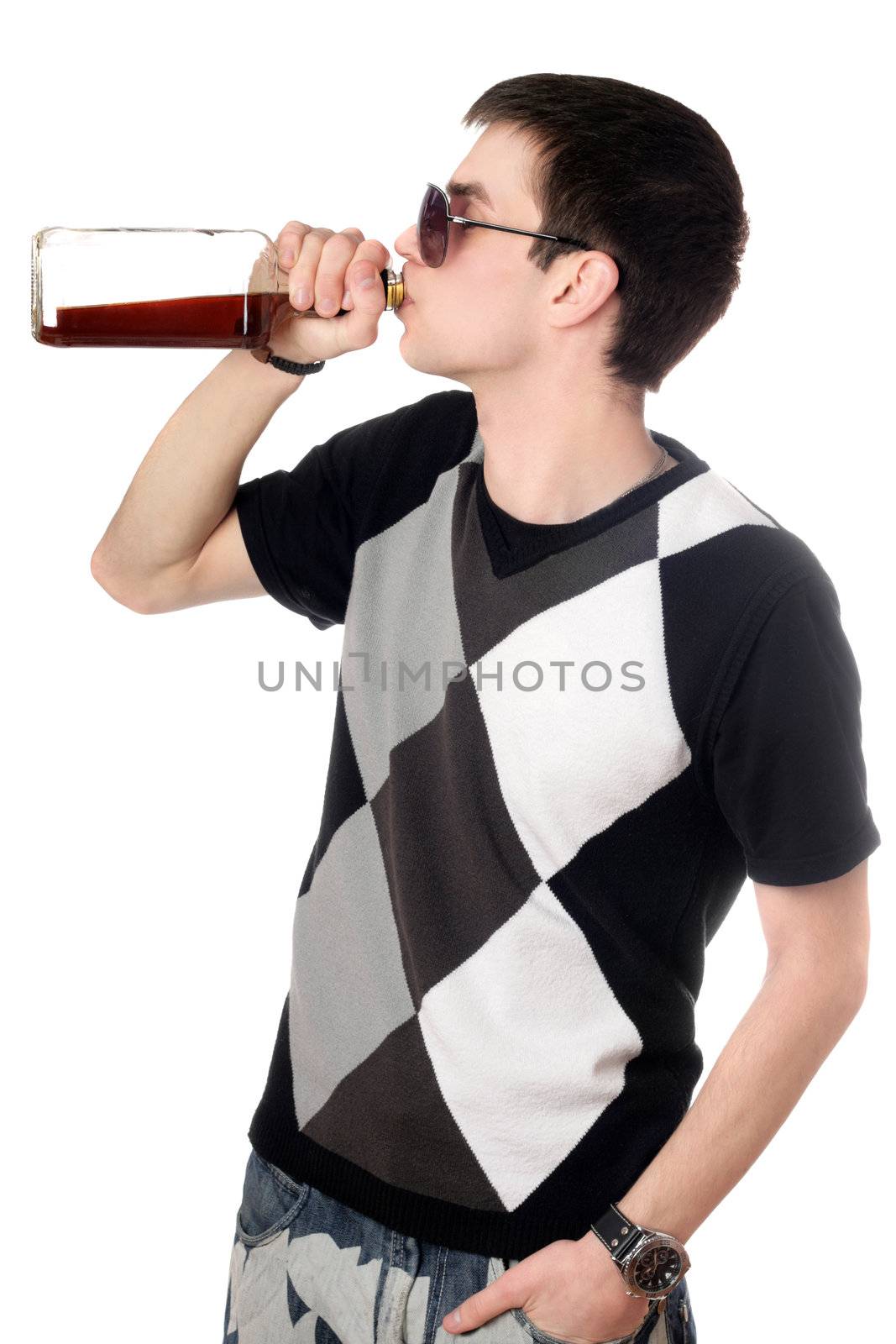 Young man with a bottle of whiskey
