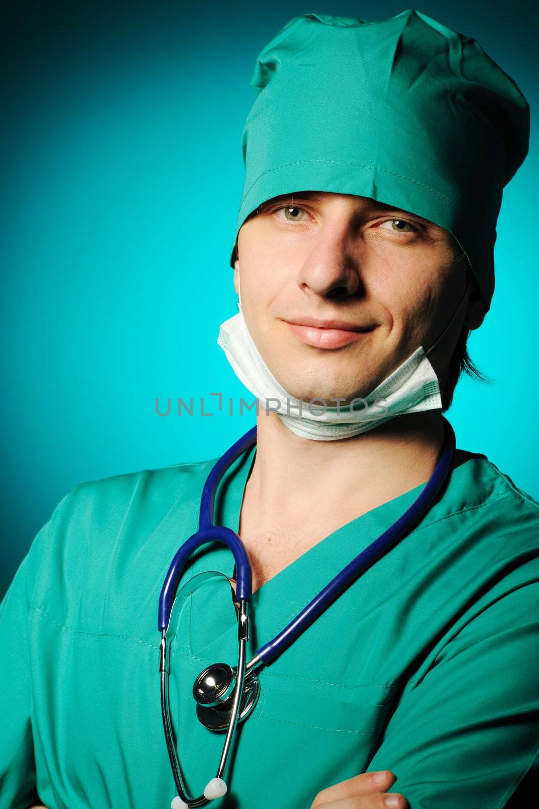 Surgeon with stethoscope over blue background