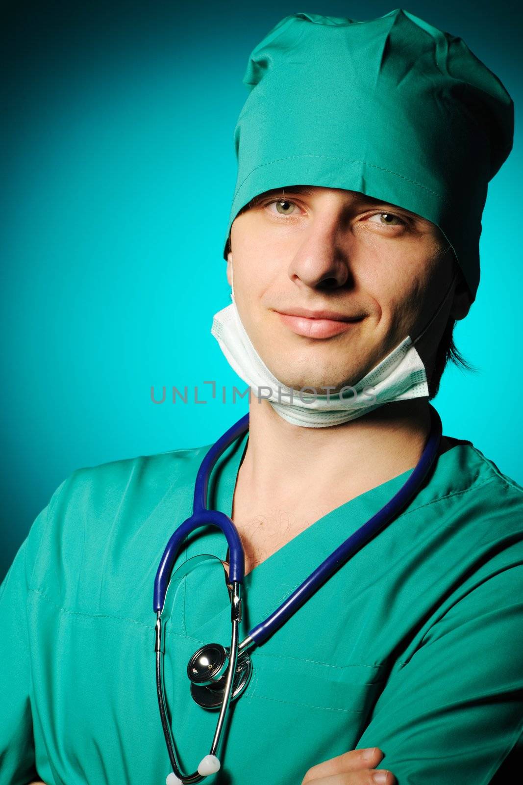 Surgeon with stethoscope over blue background