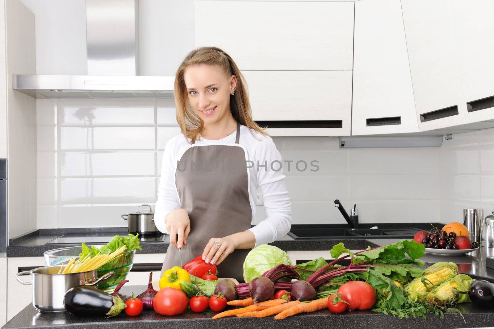 Woman cooking in modern kitchen