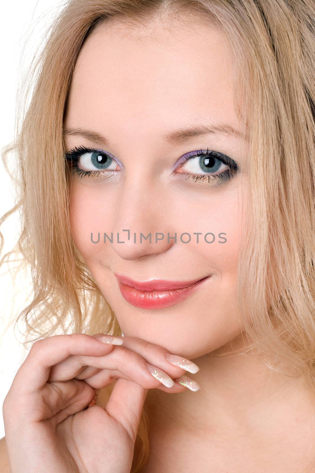 Portrait of attractive smiling blond woman. Isolated on white