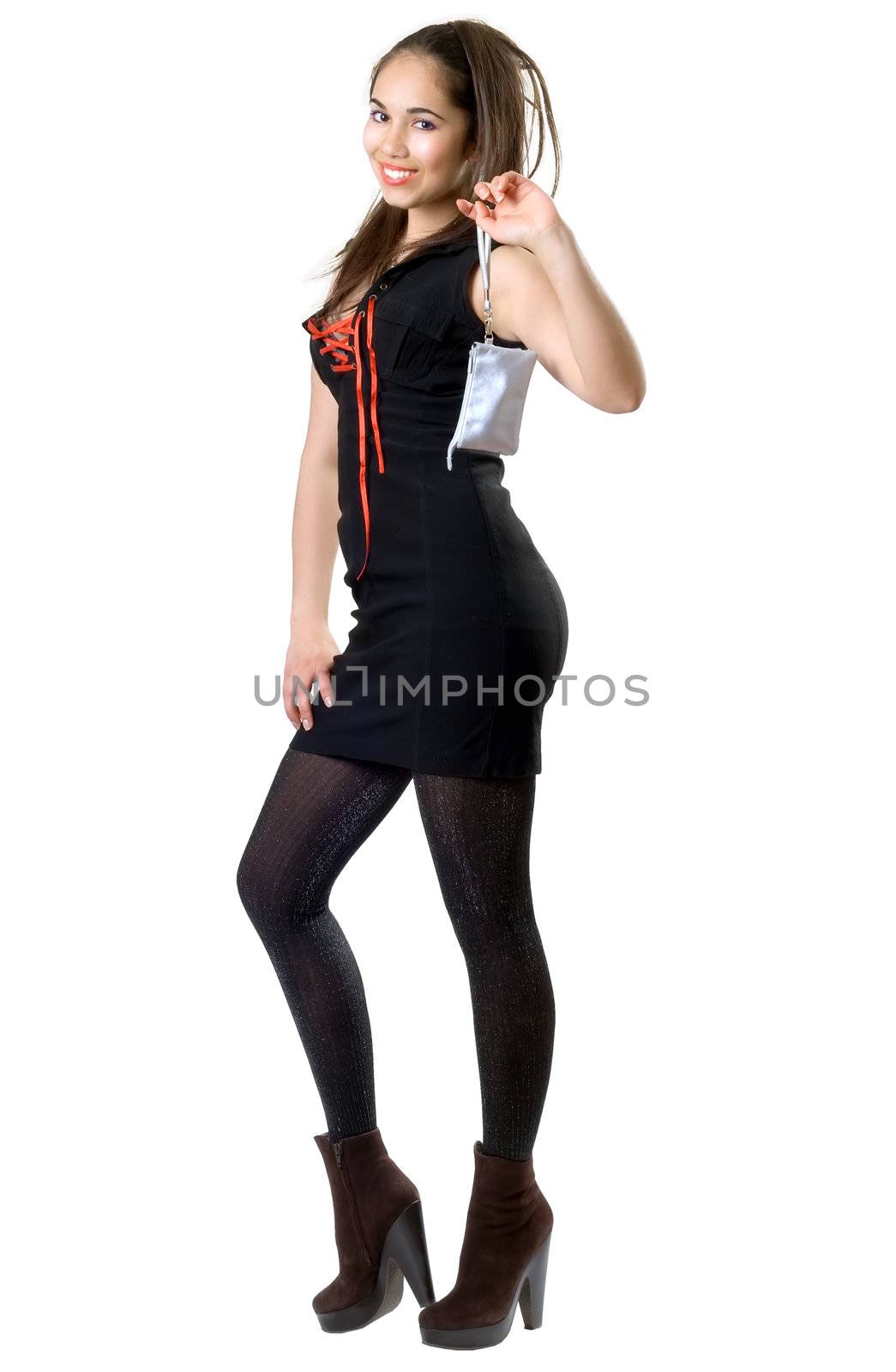 Playful pretty girl with a little handbag in black dress
