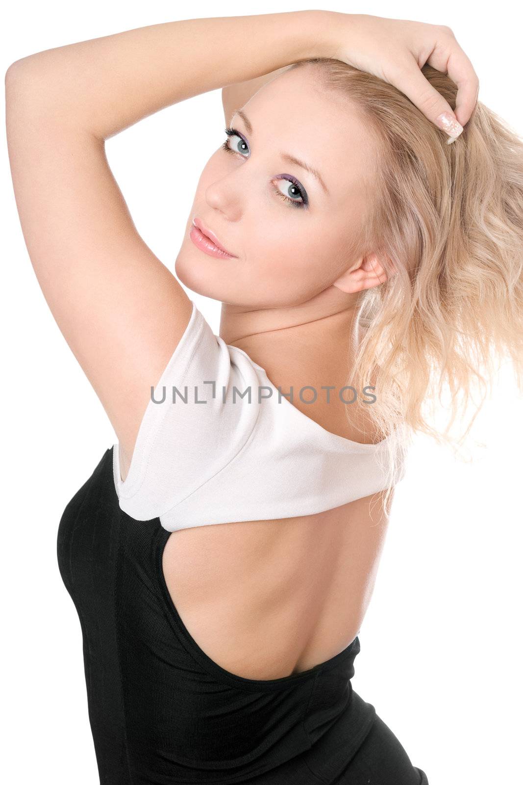 Pretty blonde posing in black-white dress. Isolated on white