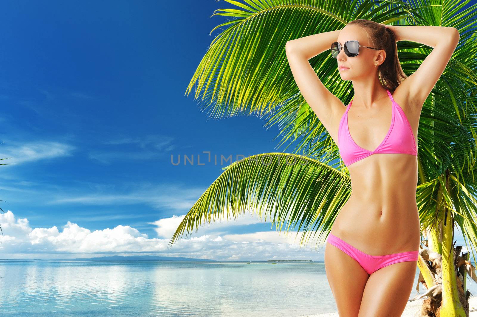 Woman with beautiful body wearing sunglasses at tropical beach. Collage.