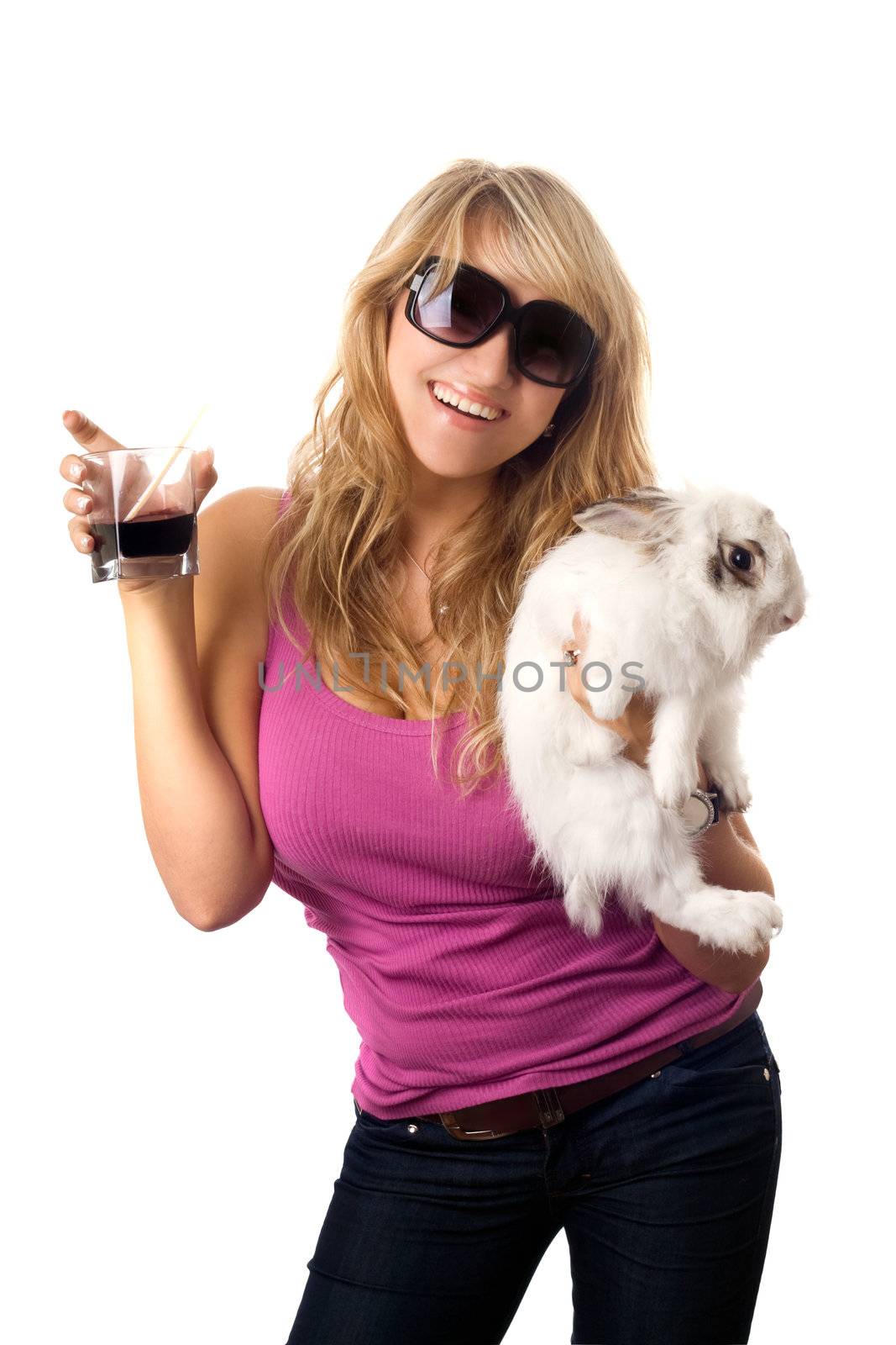 Playful young blonde with a glass of drink and little rabbit