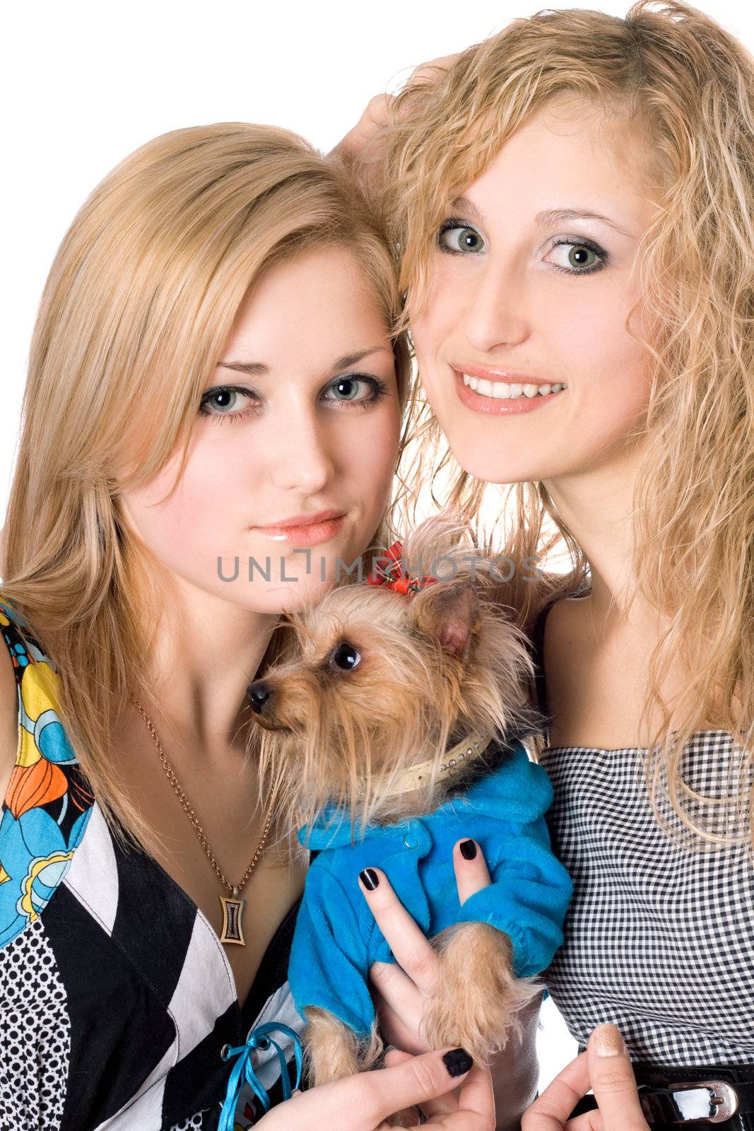 Portrait of two smiling young women with dog