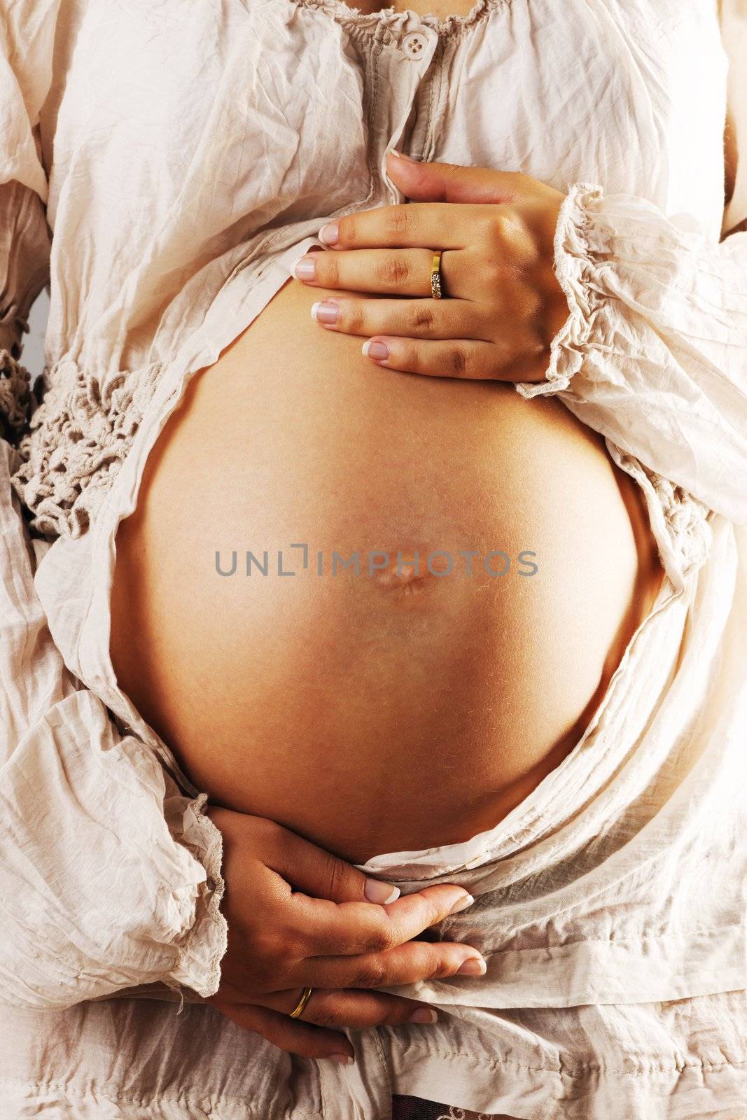 Pregnant woman belly close up