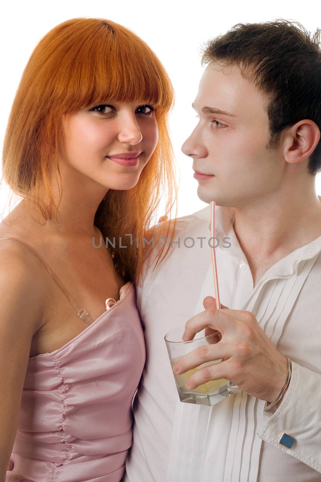 Young loving couple. Isolated on white background