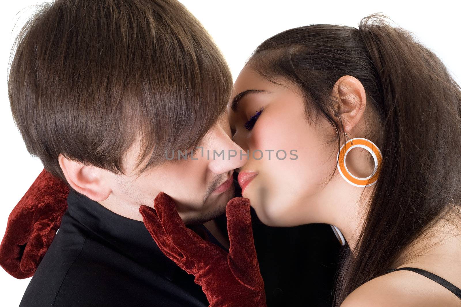 Portrait of the kissing young couple. Isolated