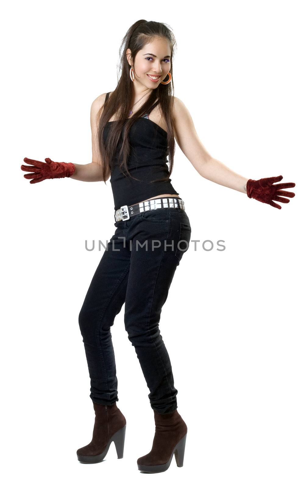 Playful pretty woman wearing black clothes and gloves. Isolated