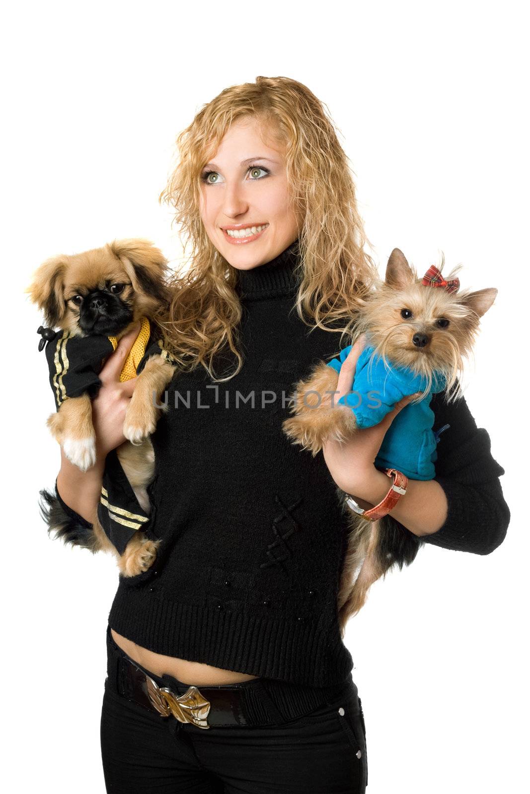 Portrait of cheerful young blonde with two dogs. Isolated