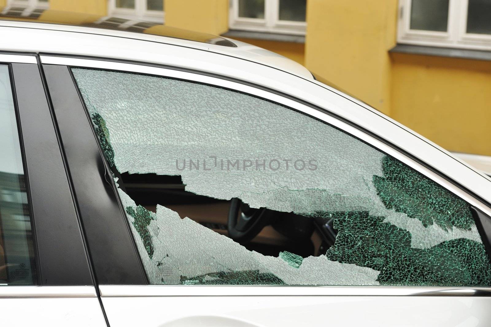 Broken passenger window, car theft