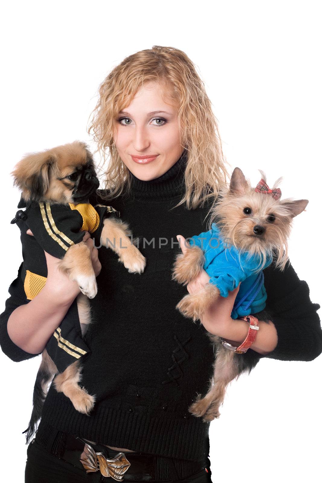 Portrait of smiling pretty blonde with two dogs. Isolated on white