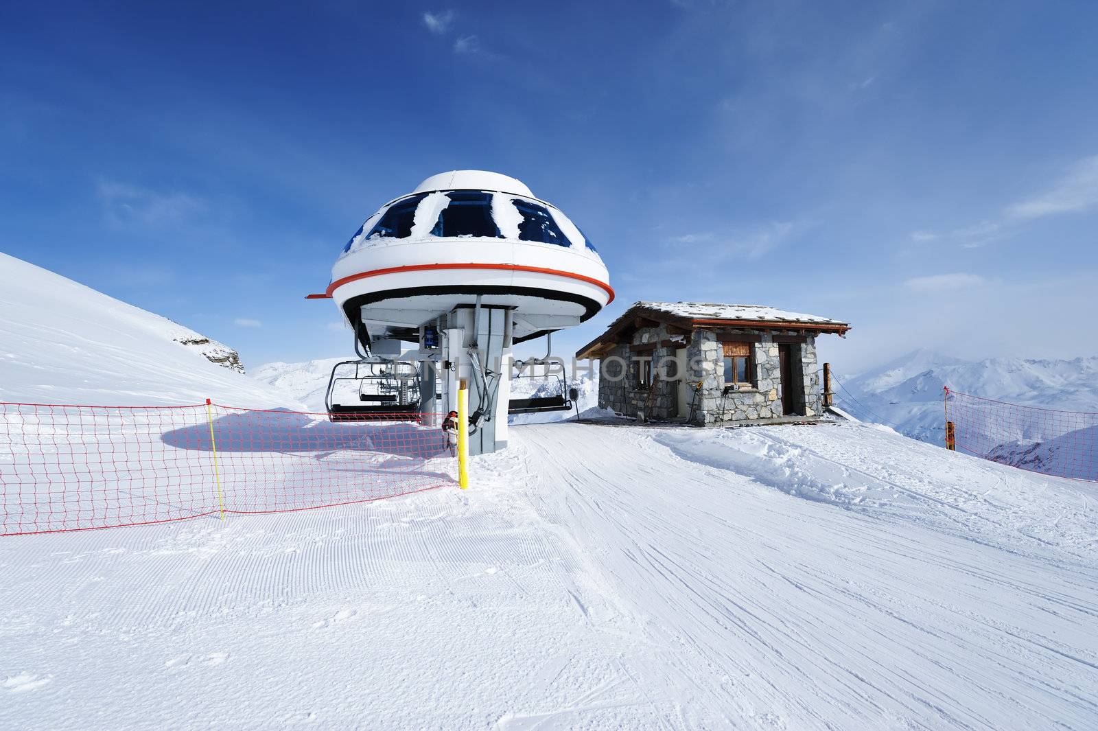 Ski lift station in mountains at winter, Val-d'Isere, Alps, France