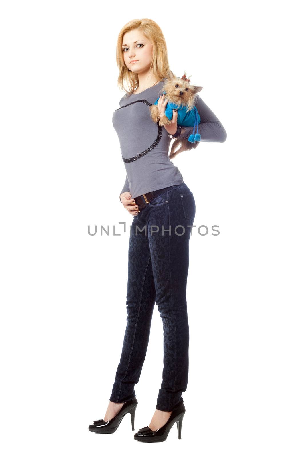 Attractive blonde posing with puppy. Isolated on white