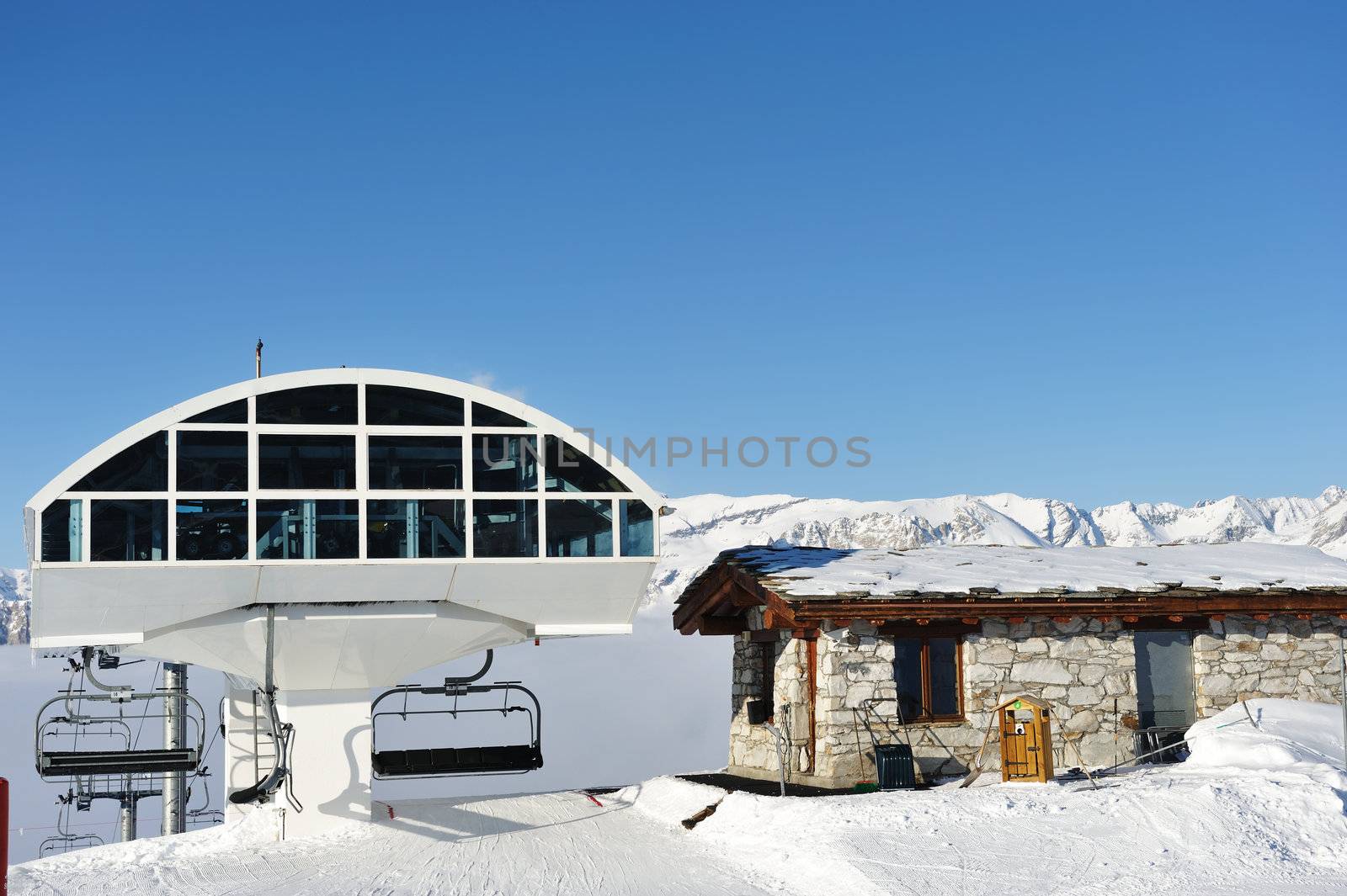 Ski lift station in mountains at winter, Val-d'Isere, Alps, France