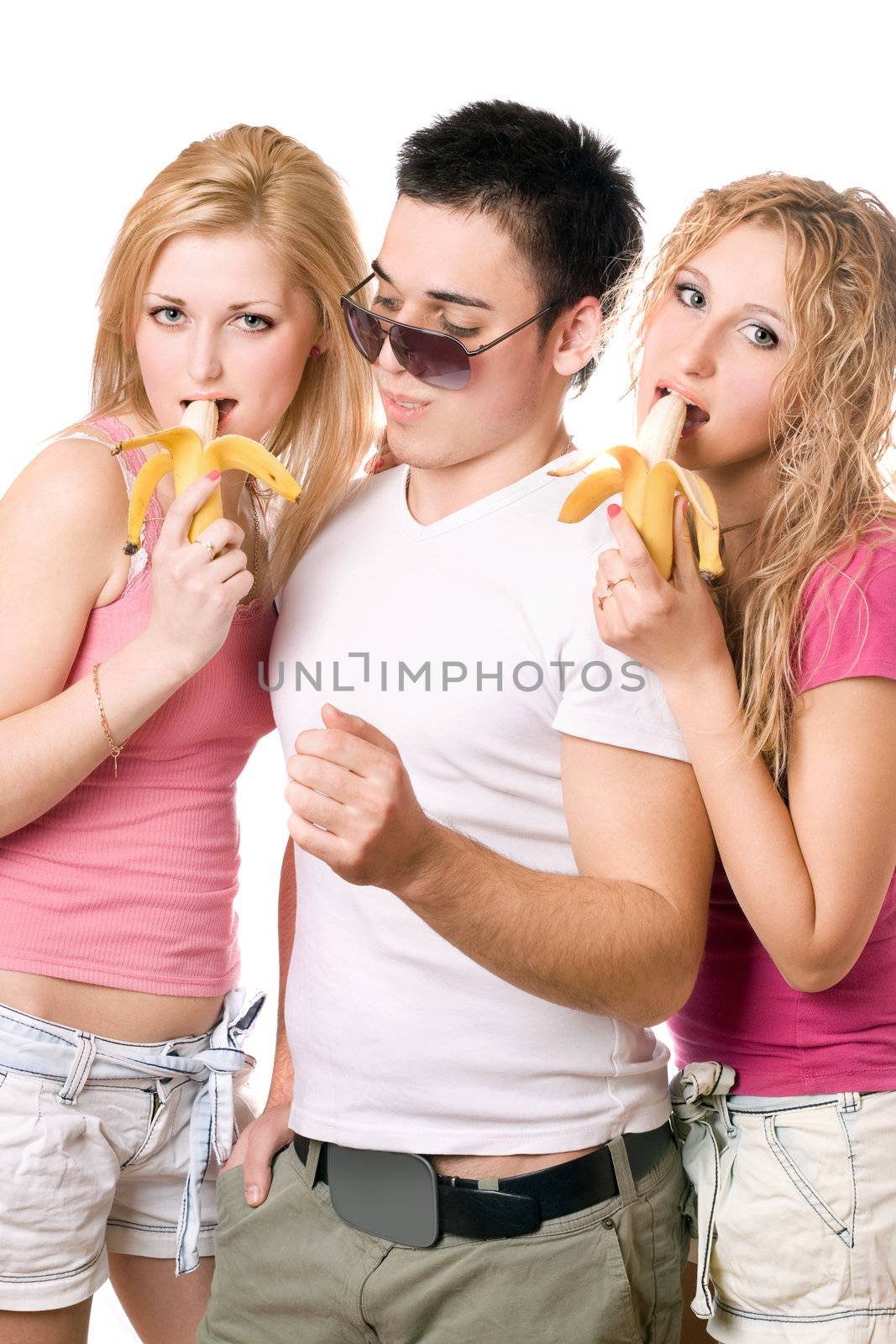 Portrait of three playful smiling young people