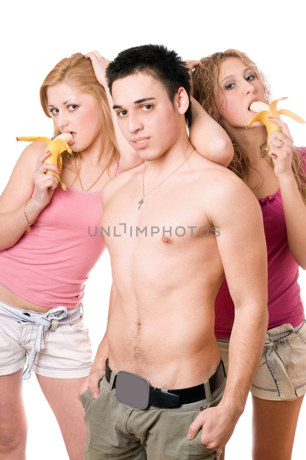 Young man and two beautiful women with bananas by acidgrey
